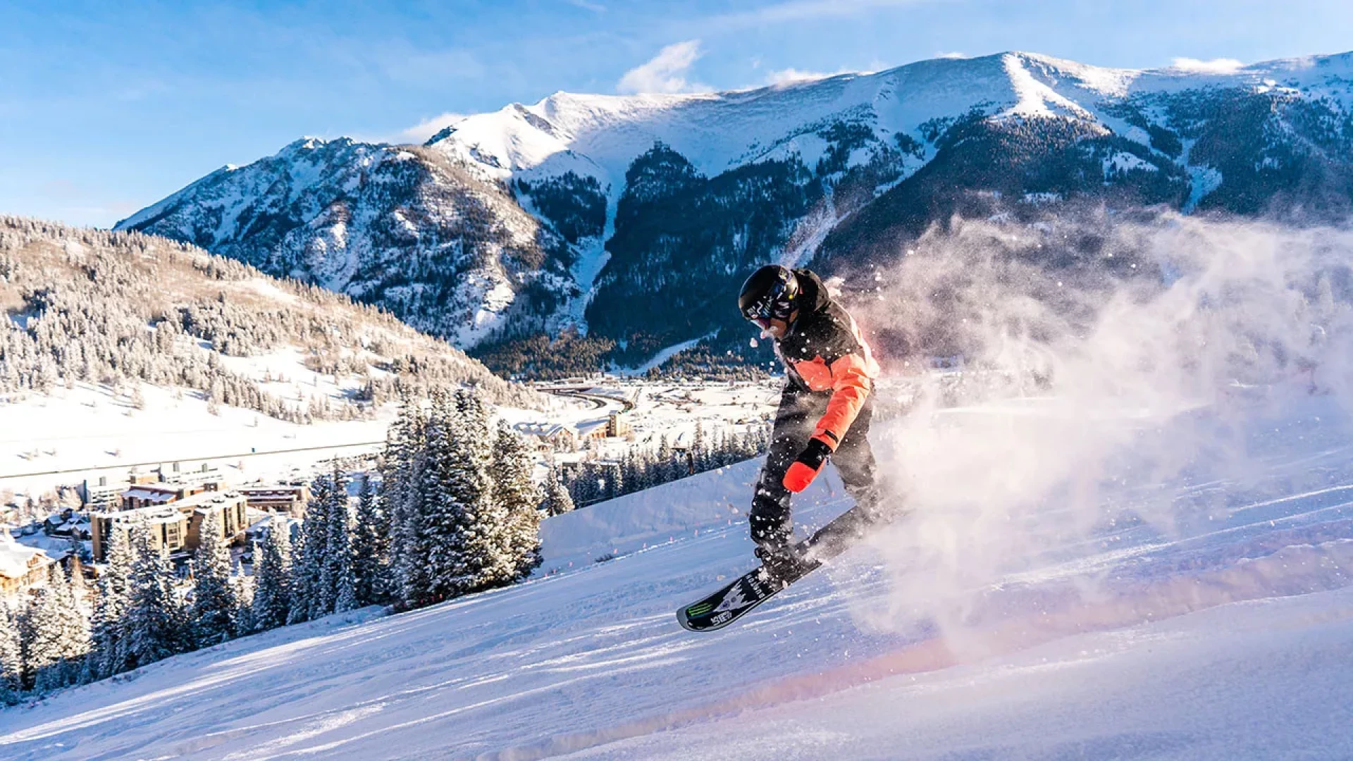 Man snowboarding on copper mountain